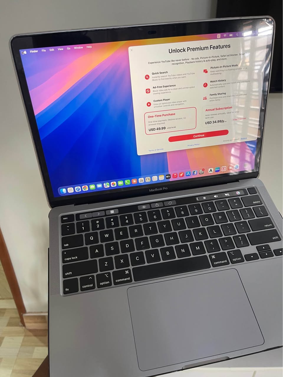A picture of Apple Mac book pro Touch Bar with 512gb storage and