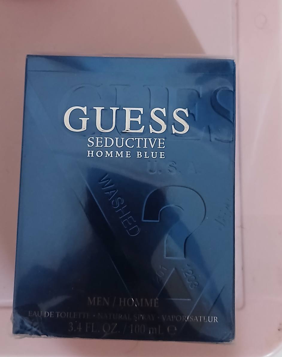 A picture of GUESS WATCH AND GUESS PERFUME