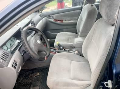 A picture of Neatly used Toyota Corolla 2004 model available for sale Engine