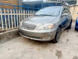 A picture of Toyota Corolla le 2004 Color Gray Properly Used All documents