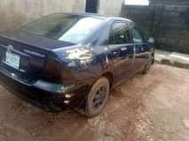 A picture of NIGERIA USED TOYOTA COROLLA BANK TYPE good engine good auto