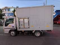 A picture of ISUZU with fridge freezer