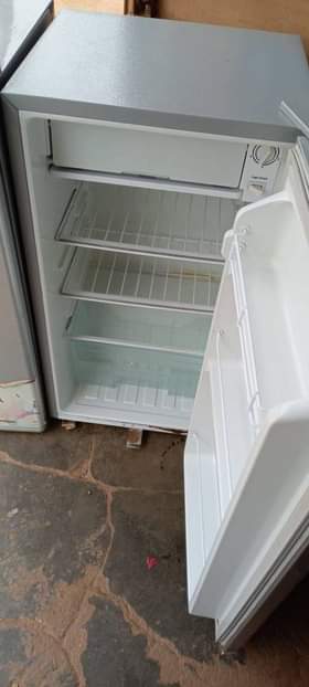 A picture of Mewe single door fridge on sale