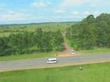 A picture of Nyakisharara 50 100 ft plots available WhatsApp 0781260064