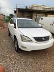 A picture of Extremely clean tokumbo standard registered white lexus rx330 with tesla