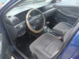 A picture of Distress Distress Auto drive Toyota Corolla bank type 2003 model