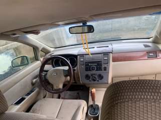 A picture of First body Nissan Tilda 4 plugs automatic Good engine and