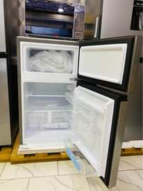 A picture of Brand new hisense 120l double door at 570k for delivery