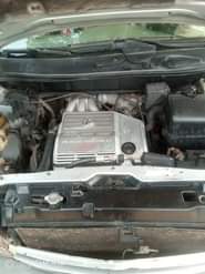 A picture of Lexus RX300 2004 model with untampered engine and gear AC
