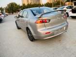 A picture of 0563289778 Mitsubishi Lancer mid option for sale bank auto loan