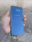 A picture of Samsung galaxy j4 core imenyook ukung kwa mbal camera ya