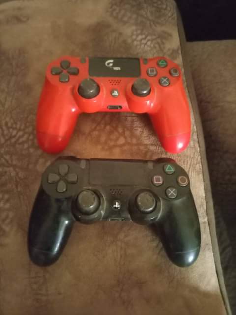 A picture of Original PS4 pads 2 of them at 100k call 0708166280