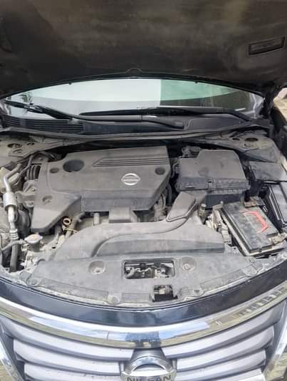 A picture of 2014 Altima toks standard 2 8m Settlement 150k rush now