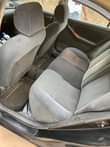 A picture of Toyota Corolla Engine tapping at the top but hardly you