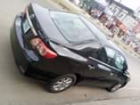 A picture of 5 months used 2011 Toyota corolla car is Sharp with