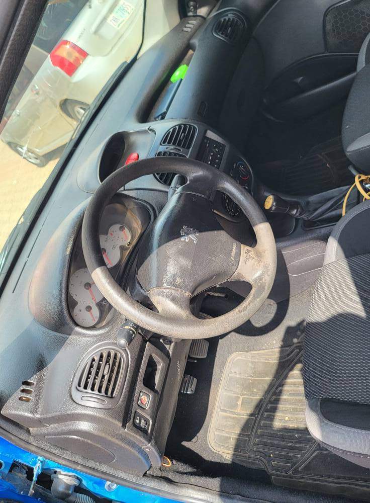 A picture of 09018042178 Extremely Clean Nigerian used Peugeot 206 manual transmission. 2005