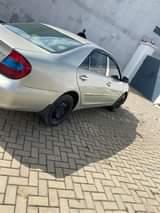A picture of Clean 2004 Toyota Camry buy and traveling clean in and