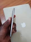 A picture of iPhone 6S 64GB nauza 100000 ya haraka simu imecreck kioo