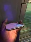 A picture of iPhone 11 Pro Max 256 with small covered crack at