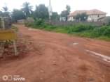 A picture of 32 decimals for sale in Kisaasi Komamboga ready title asking