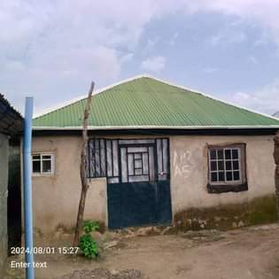 A picture of Kabusa behind Community School