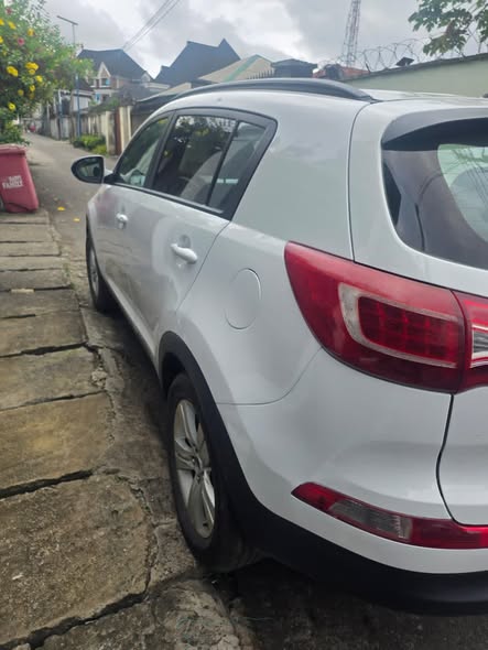 A picture of 2014 Mint Kia Sportage Price 6M Broker Fee 200k Location