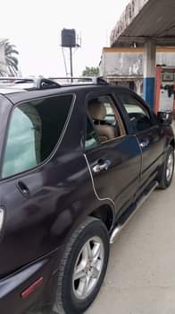 A picture of Neatly used lexus Rx 300 With neat body Interior sharp