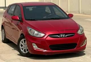 A picture of URGENT BUYER NEEDED 2013 HYUNDAI ACCENT HATCHBACK Factory AC clean