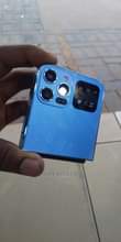 A picture of NEW APPLE LOG BUTTON PHONE WITH TRIPPLE CAMERA APPLE LOG