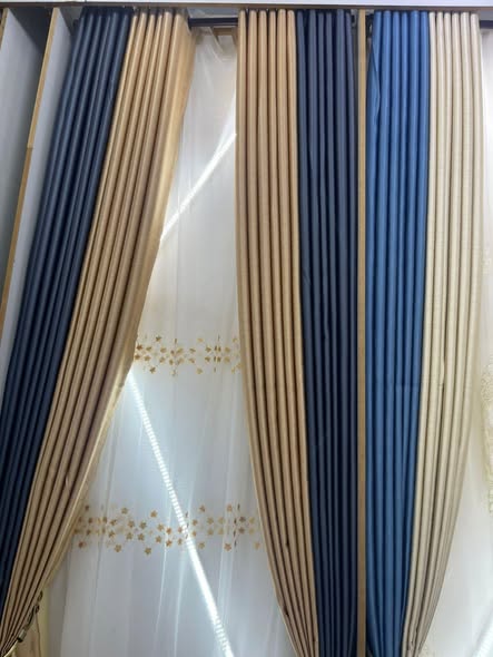 A picture of CURTAINS CARPETS OFFICE BLINDS