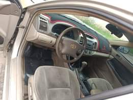 A picture of Clean 05 Toyota Camry Tinted Glass Untampered engine and gear