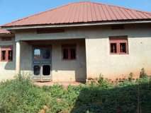 A picture of 2 bedroom and sitting room with store at lukwanga town