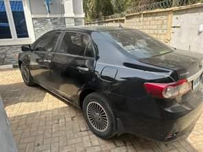 A picture of Extremely clean 2012 Toyota Corolla with ac gear and engine