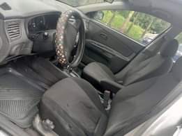 A picture of Automatic kia Rio with sound engine N1.880m ph ac needs