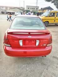 A picture of URGENT SALE Clean Reg 03 Nissan Sentra 4 plugs fabrics