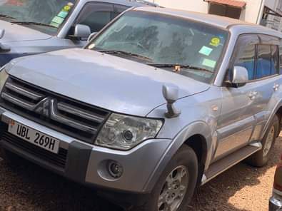 A picture of Pajero bitama petrol in excellent condition 2010 Two cars each