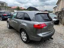 A picture of Brand Acura Model MDX Year 2008 AC 3row seats Amount