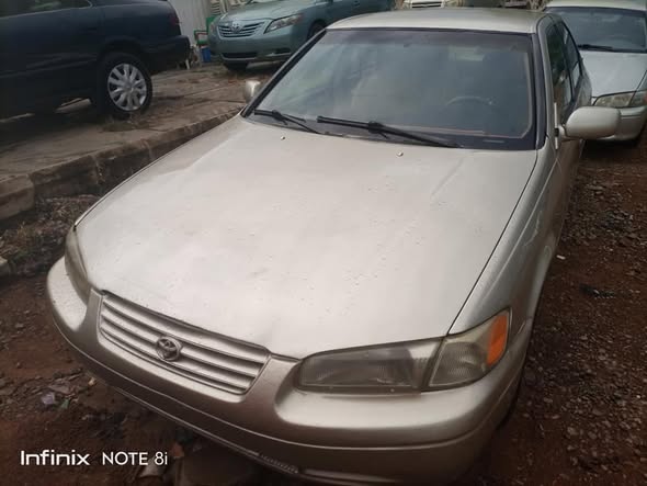 A picture of 1999 model Toyota Camry All documents intact with untempered engine