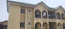 A picture of 4 units of 2 bedrooms 3 shops for sale.