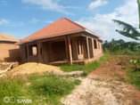 A picture of A shell house for sale in Namugongo sonde hill view.