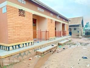 A picture of 6 single rooms for sale in bulenga just 1km from