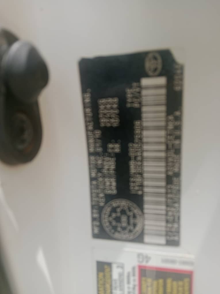 A picture of  V.Clean white Toyota Camry 2010 