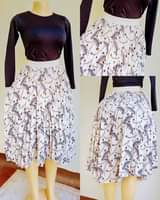 A picture of Round stretcher pleats and office skirts all I have