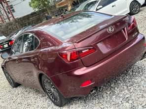 A picture of Extremely clean is250 Lexus full option red on nature Double