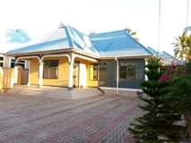 A picture of 2 houses for sales Tsh 88 millions at Kivule Hospital