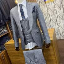 A picture of UG. SHS. 250 000 ONLY YES 250k ONLY SUITS SUITS