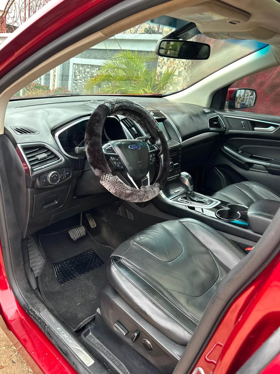A picture of 2016 Ford edge titanium with 4plug engine