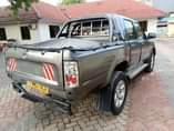 A picture of TOYOTA HILUX DOUBLE CABIN 1997 MODEL REG NO ACA