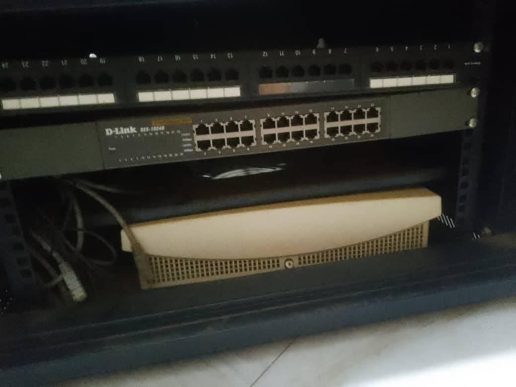 A picture of Am selling a rack 24 port switch and a Panasonic