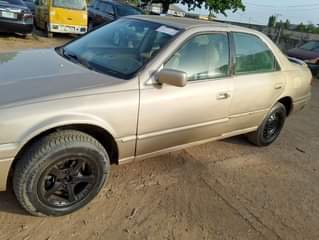 A picture of Now available for sale Toyota Camry tiny light gold color